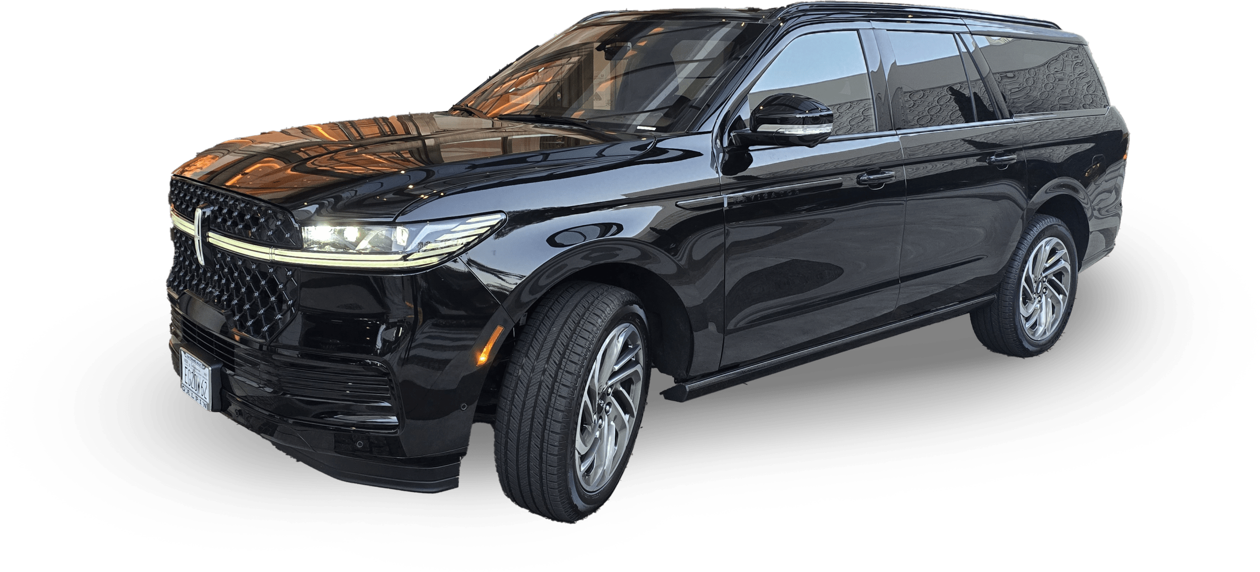 Luxury black SUV showcasing sleek design and detailed front grille, emphasizing modern elegance and performance features.